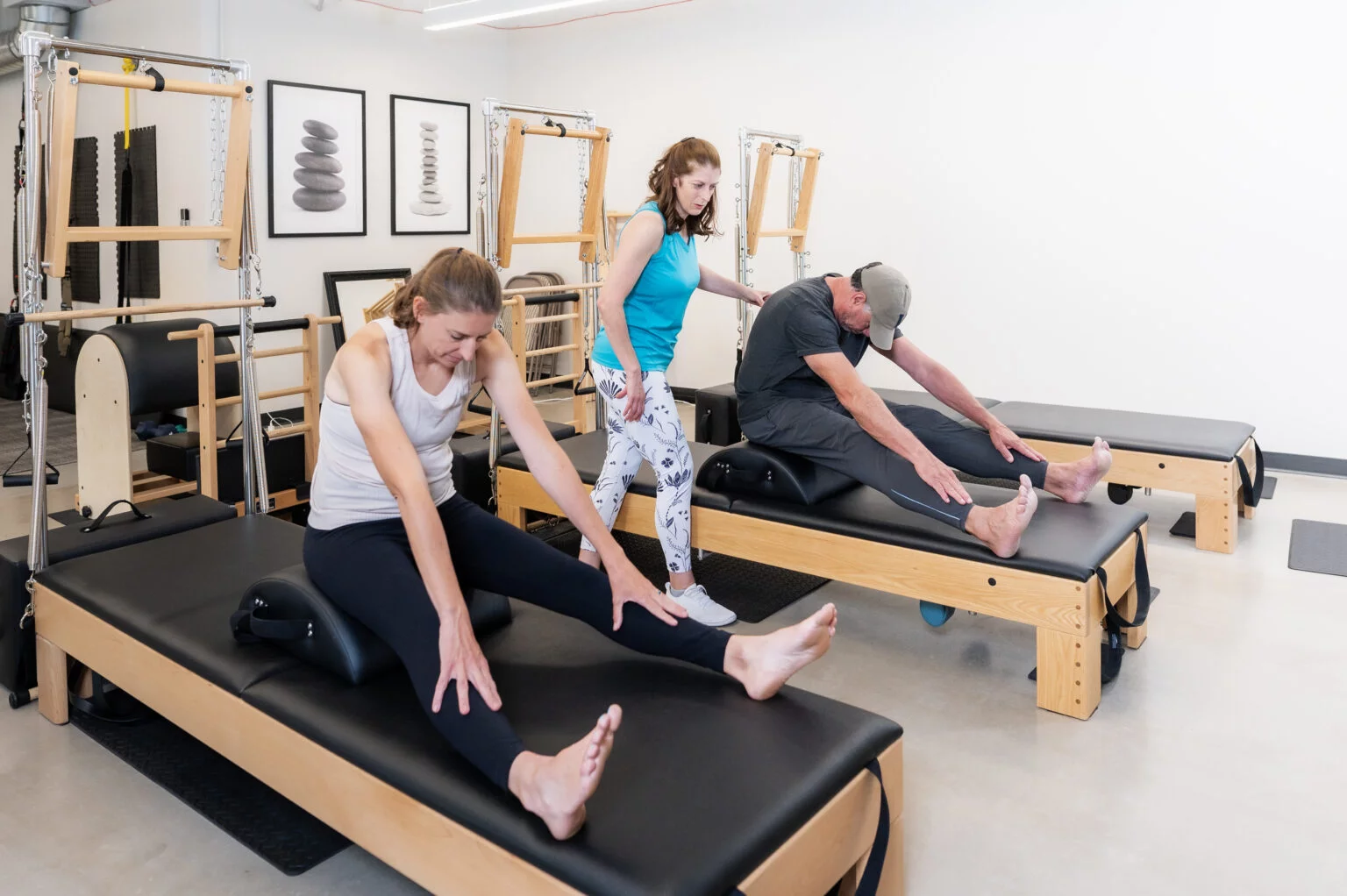 Small group Pilates equipment class in Denver